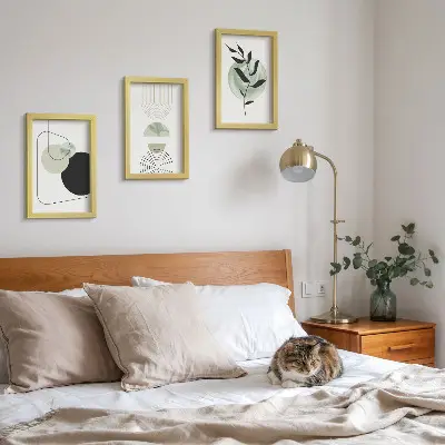 Photo frame wall gallery with abstract shapes and green plant motifs