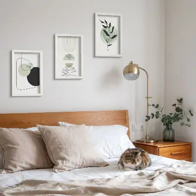 Photo frame wall gallery with abstract shapes and green plant motifs