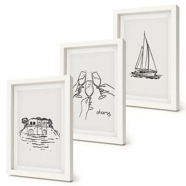 Photo frame wall views of the house by the water, toast with glasses, and a sailboat