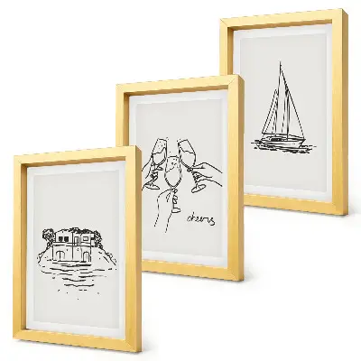 Photo frame wall views of the house by the water, toast with glasses, and a sailboat