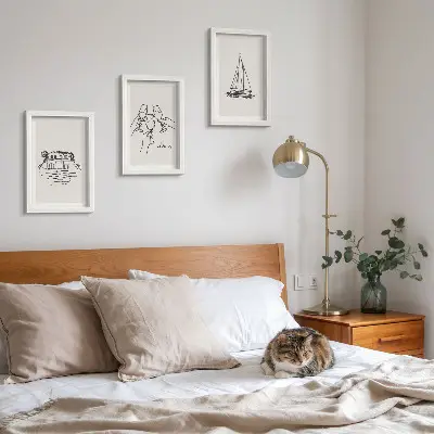 Photo frame wall views of the house by the water, toast with glasses, and a sailboat