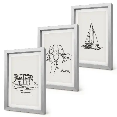 Photo frame wall views of the house by the water, toast with glasses, and a sailboat