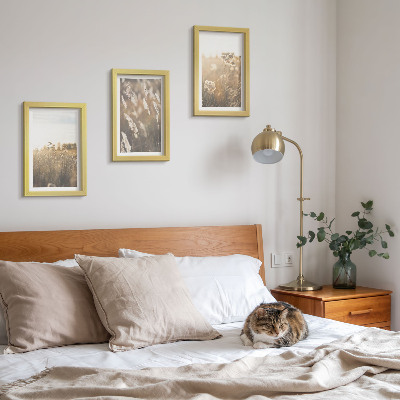 3-piece wall art set A landscape with grasses and flowers in warm shades