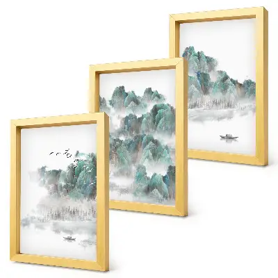 Framed triptych mountains in the clouds with birds and a boat on the water japandi style
