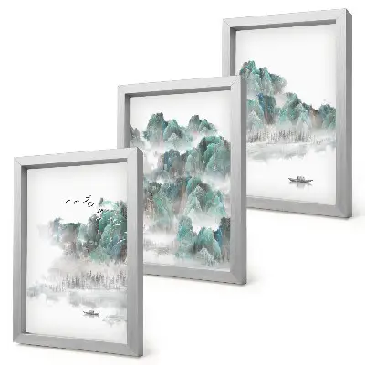 Framed triptych mountains in the clouds with birds and a boat on the water japandi style