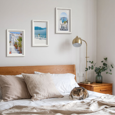 Framed triptych White stairs with plants, sea view and gate