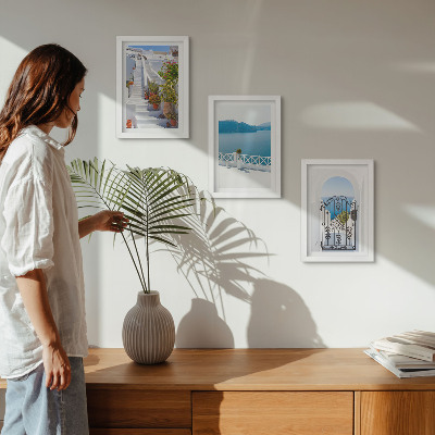 Framed triptych White stairs with plants, sea view and gate
