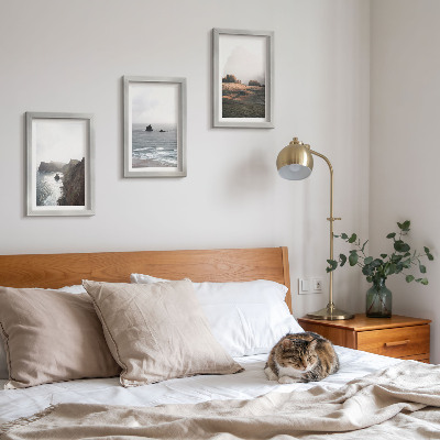 Photo frame wall Mountain and sea landscapes with clouds and forests