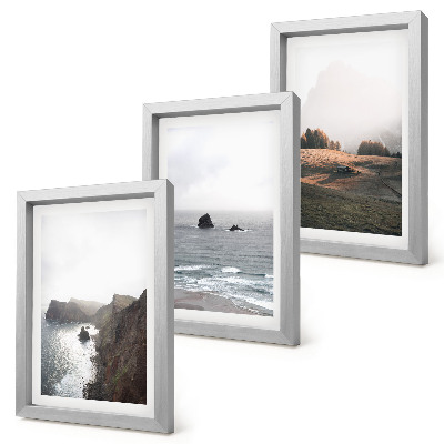 Photo frame wall Mountain and sea landscapes with clouds and forests