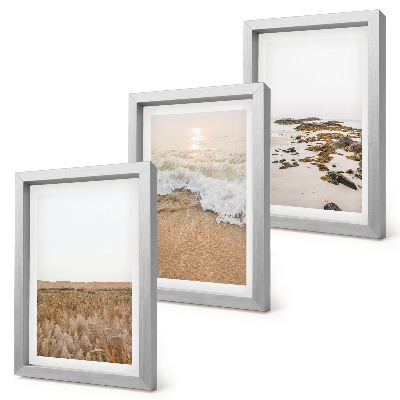Photo frame wall Beach with waves and sea stones in summer