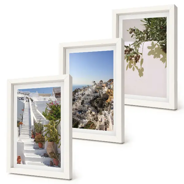 Photo frame wall white stairs in Santorini with a town view