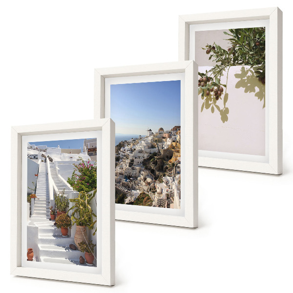 Photo frame wall White stairs in Santorini with a view of the town