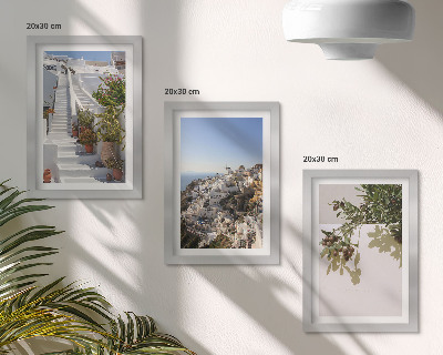 Photo frame wall White stairs in Santorini with a view of the town