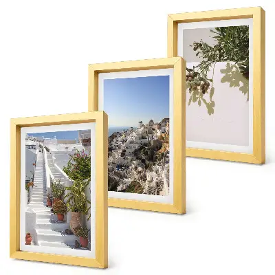 Photo frame wall white stairs in Santorini with a town view