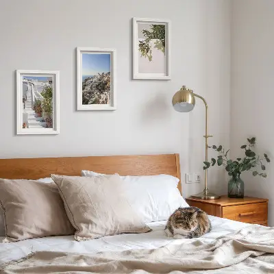 Photo frame wall white stairs in Santorini with a town view