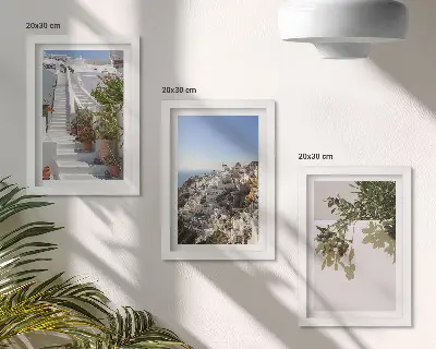 Photo frame wall white stairs in Santorini with a town view