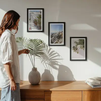 Photo frame wall white stairs in Santorini with a town view