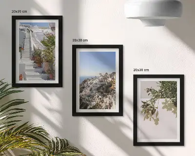 Photo frame wall white stairs in Santorini with a town view
