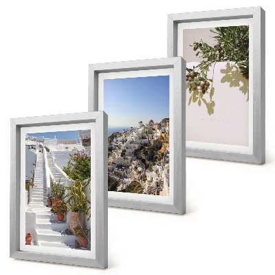 Photo frame wall White stairs in Santorini with a view of the town