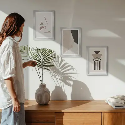 Abstract geometric shapes and a woman's face framed triptych