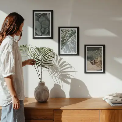 Photo frame wall with tropical plants and summer holiday accents