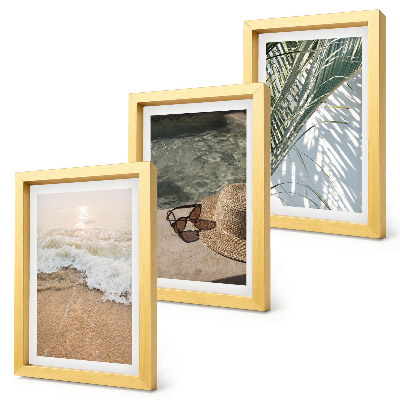 Photo frame wall Water beach hat and sunglasses leaves