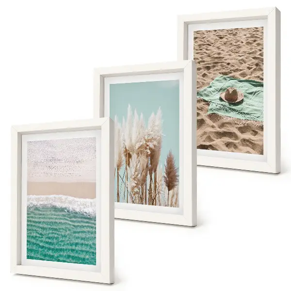 3-piece wall art set featuring a relaxing beach scene with waves, grass, a hat, and sand