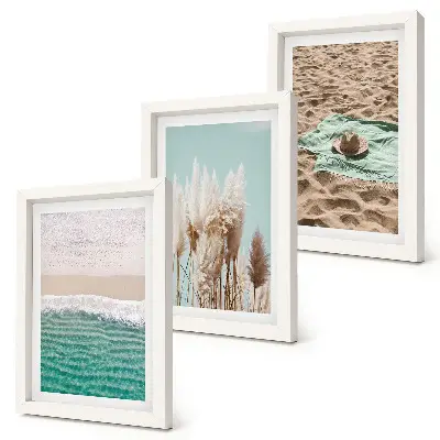 3-piece wall art set featuring a relaxing beach scene with waves, grass, a hat, and sand
