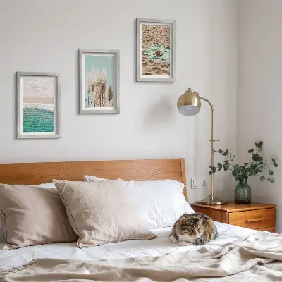 3-piece wall art set featuring a relaxing beach scene with waves, grass, a hat, and sand