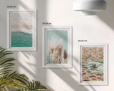 3-piece wall art set featuring a relaxing beach scene with waves, grass, a hat, and sand