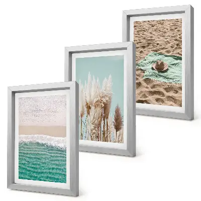 3-piece wall art set featuring a relaxing beach scene with waves, grass, a hat, and sand