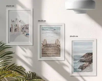 Photo frame wall featuring views of the sea and Santorini architecture against the sky