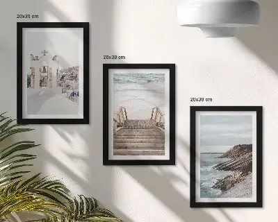 Photo frame wall featuring views of the sea and Santorini architecture against the sky