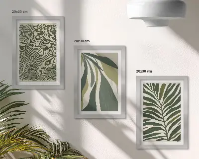 Photo frame wall with leaf patterns and wavy lines in green shades