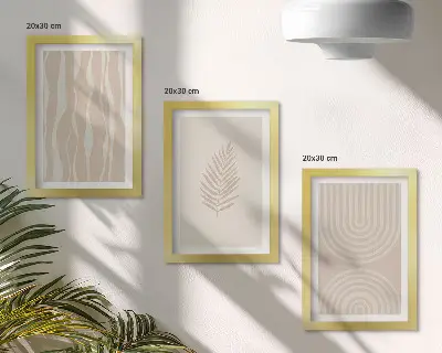 Framed triptych featuring plant motifs in shades of beige