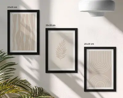 Framed triptych featuring plant motifs in shades of beige