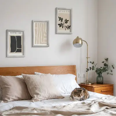 Photo frame wall gallery with abstract shapes and plant motifs in neutral tones