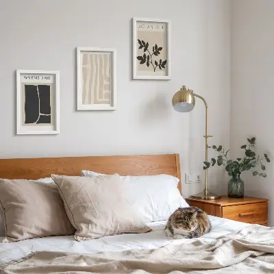 Photo frame wall gallery with abstract shapes and plant motifs in neutral tones