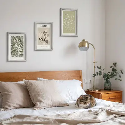 Photo frame wall with plant motifs in subdued colors and patterns