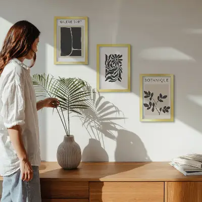 Photo frame wall gallery with abstract plant patterns and geometric shapes