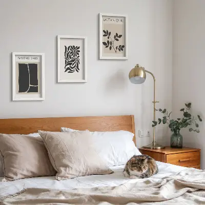 Photo frame wall gallery with abstract plant patterns and geometric shapes
