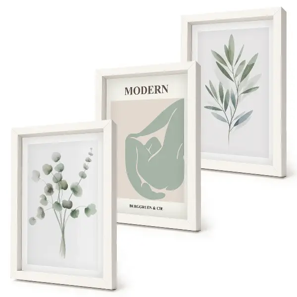 Photo frame wall with plant motifs in delicate shades of green