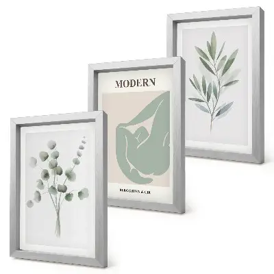 Photo frame wall with plant motifs in delicate shades of green