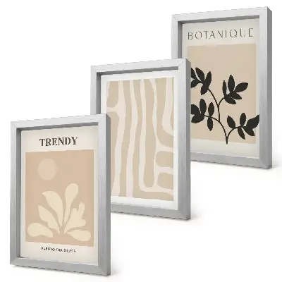 Photo frame wall with stylish plant patterns in shades of beige and black