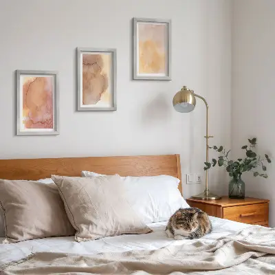 Photo frame wall with warm watercolor canvas art and colorful textures