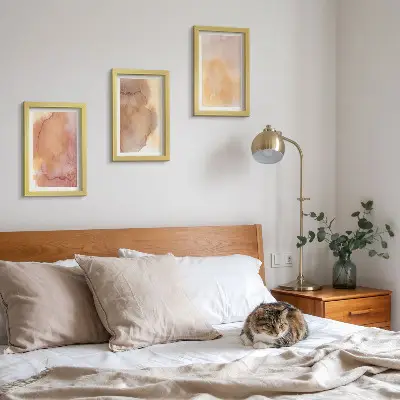 Photo frame wall with warm watercolor canvas art and colorful textures
