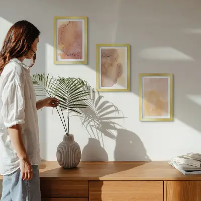 Photo frame wall with warm watercolor canvas art and colorful textures