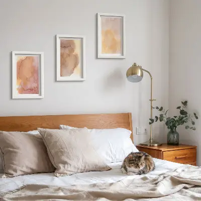 Photo frame wall with warm watercolor canvas art and colorful textures