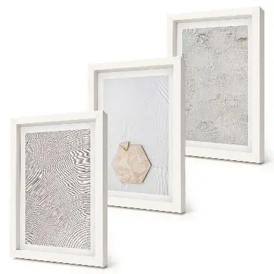 Photo frame wall light textures on the sand in a delicate boho style