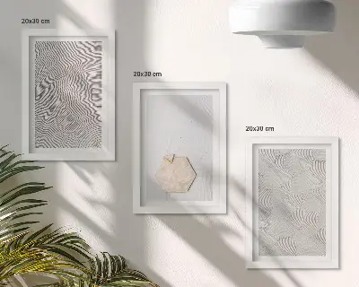 Photo frame wall light textures on the sand in a delicate boho style